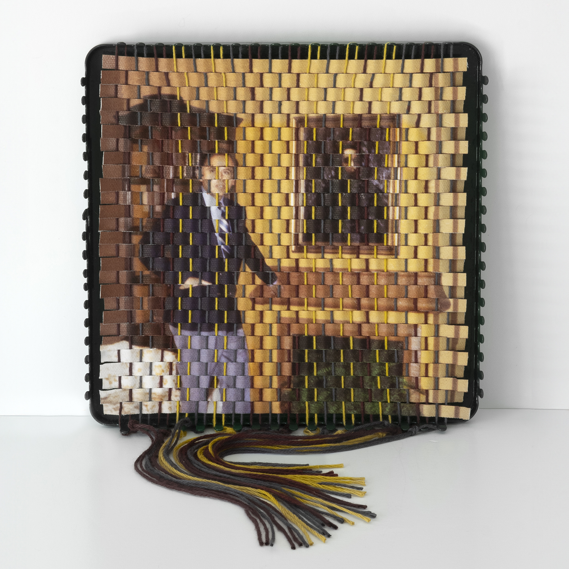 A family photograph that has been torn apart and resewn using a vintage pot holder loom, created by Pam Connolly for her &ldquo;Columbus Drive&rdquo; series