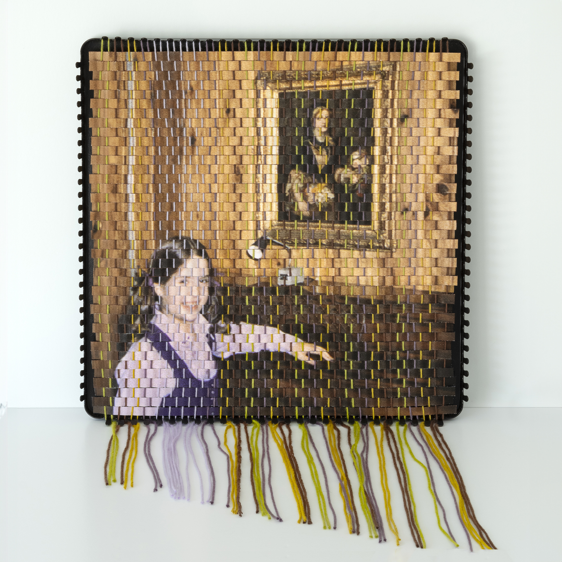 A family photograph that has been torn apart and resewn using a vintage pot holder loom, created by Pam Connolly for her &ldquo;Columbus Drive&rdquo; series