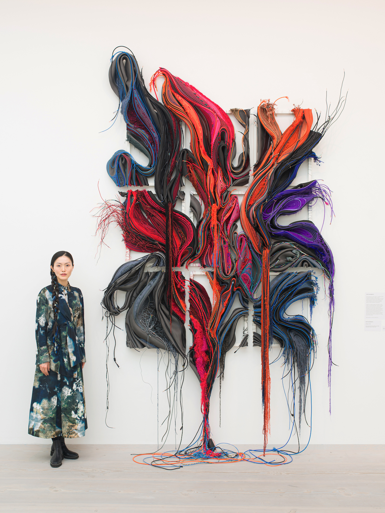 Glimpse, 2025. String, yarn, discarded electrical cable, rubber tube, elastic cord, foam, and cloth.