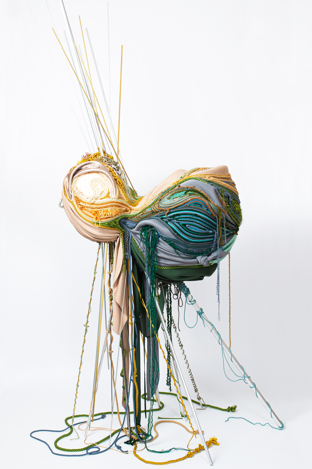 Balance, 2025. String, string, yarn, cloth, foam, copper, aluminium, iron, brass.