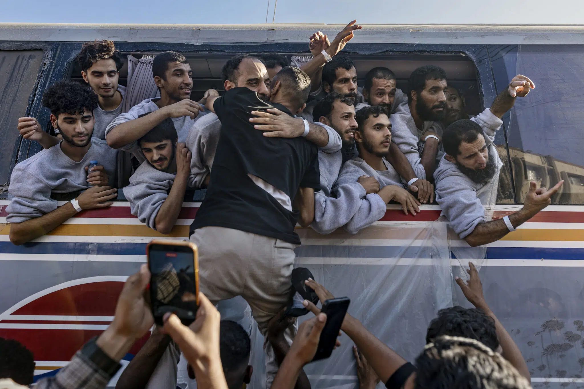 Saher Alghorra, &ldquo;Witnessing Gaza,&rdquo; for the New York Times. Palestinian detainees and prisoners arrive at Nasser Hospital after being released from Israeli custody as part of the ceasefire agreement. Israel freed nearly 2,000 Palestinians. Khan Younis, Gaza Strip, October 13, 2025.