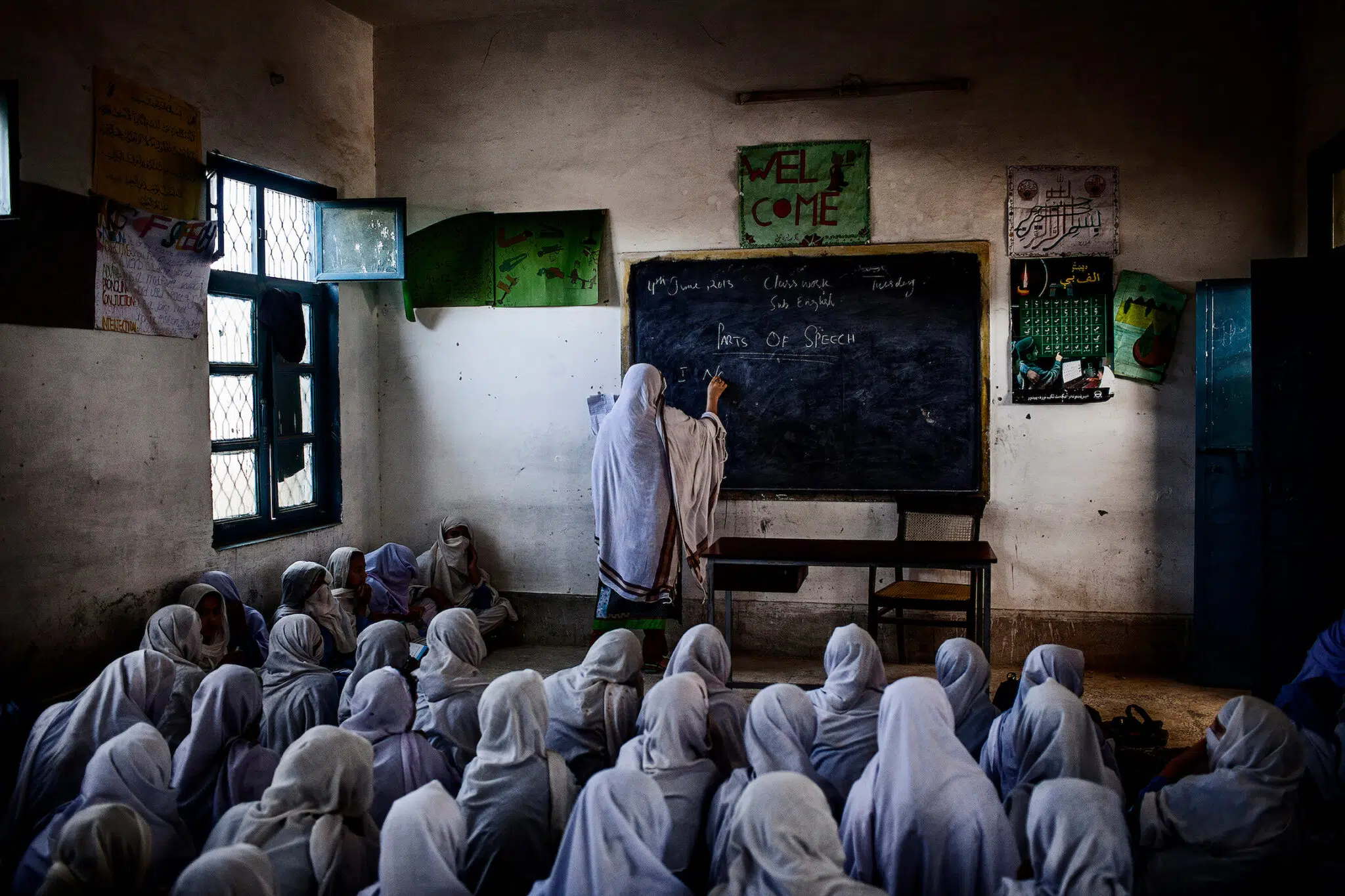 Diego Ibarra S&aacute;nchez, &ldquo;Hijacked Education.&rdquo; Female students attend class at their school, which was attacked by the Taliban on 21 December 2012 as part of a campaign to prevent girls from accessing education. Swabi, Khyber Pakhtunkhwa, Pakistan, June 4, 2013.