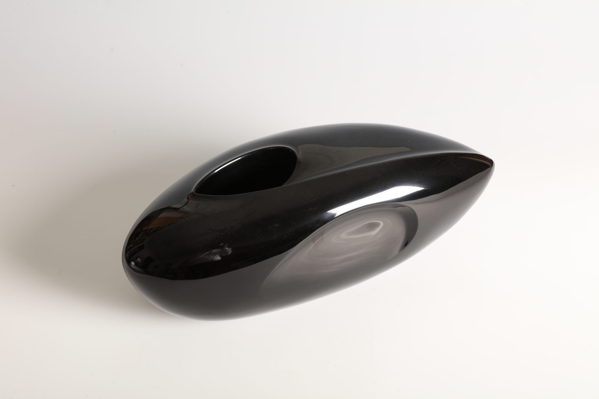 Kubo Kinpei, &ldquo;Black Elephant&rdquo; flower vessel, 1960s. Kanshitsu dry-lacquer with roiro mirror-black finish.