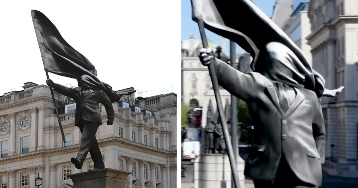 A statue of a figure in a suit holding an anti-imperial flag, set against classical architecture