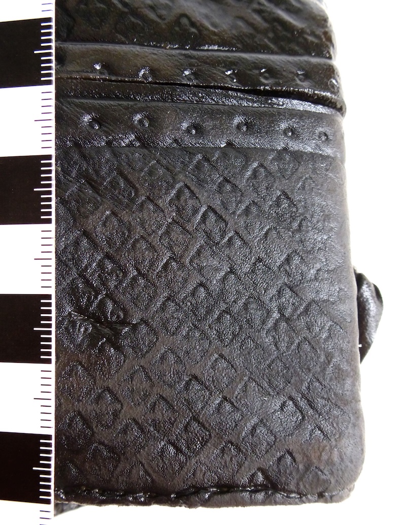 Medieval notebook leather binding embossed with fleur-de-lis