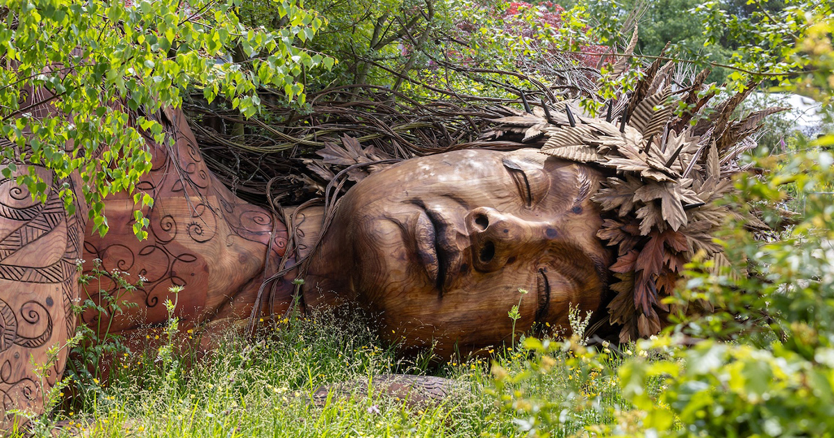 Giant Sleeping Gaia Sculpture Rests Among Wildflowers at Chelsea Flower Show’s Garden of the Year