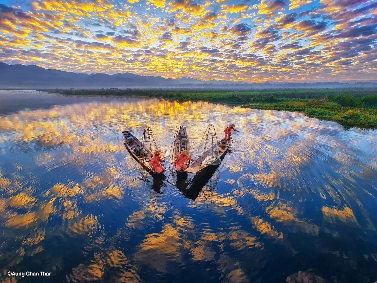 Boat over golden clouds