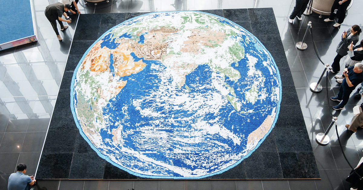 Artist Spends 6 Years Crafting 300,000 Paper Quills for Massive Portrait of Planet Earth