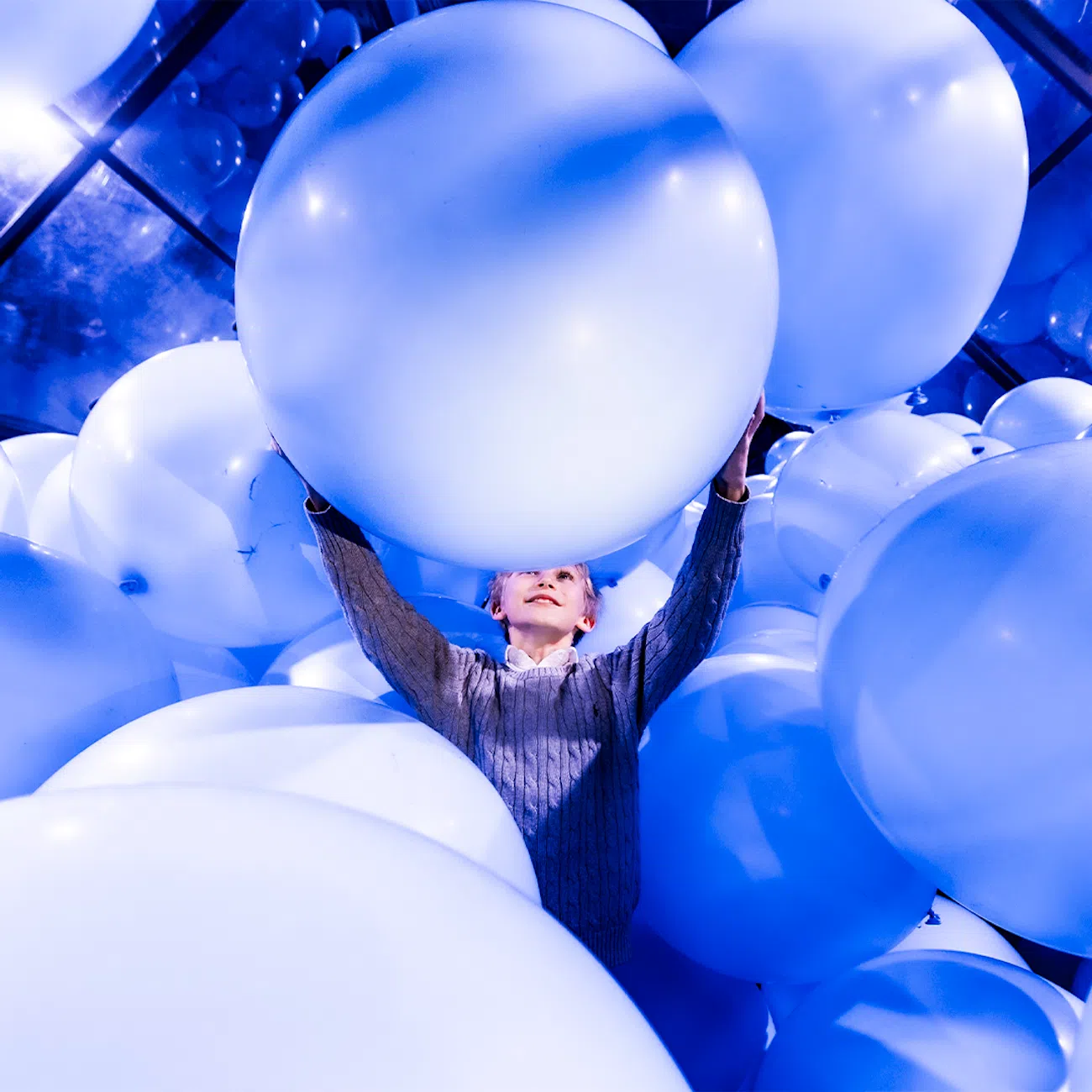 Boy with balloons.