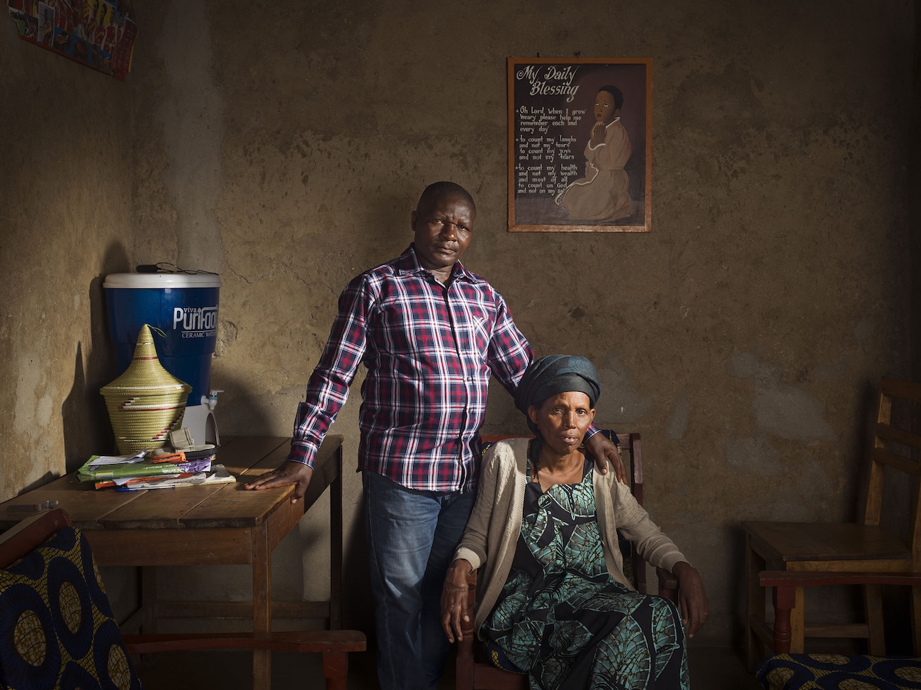 Two People in Rwanda Posing Together in House