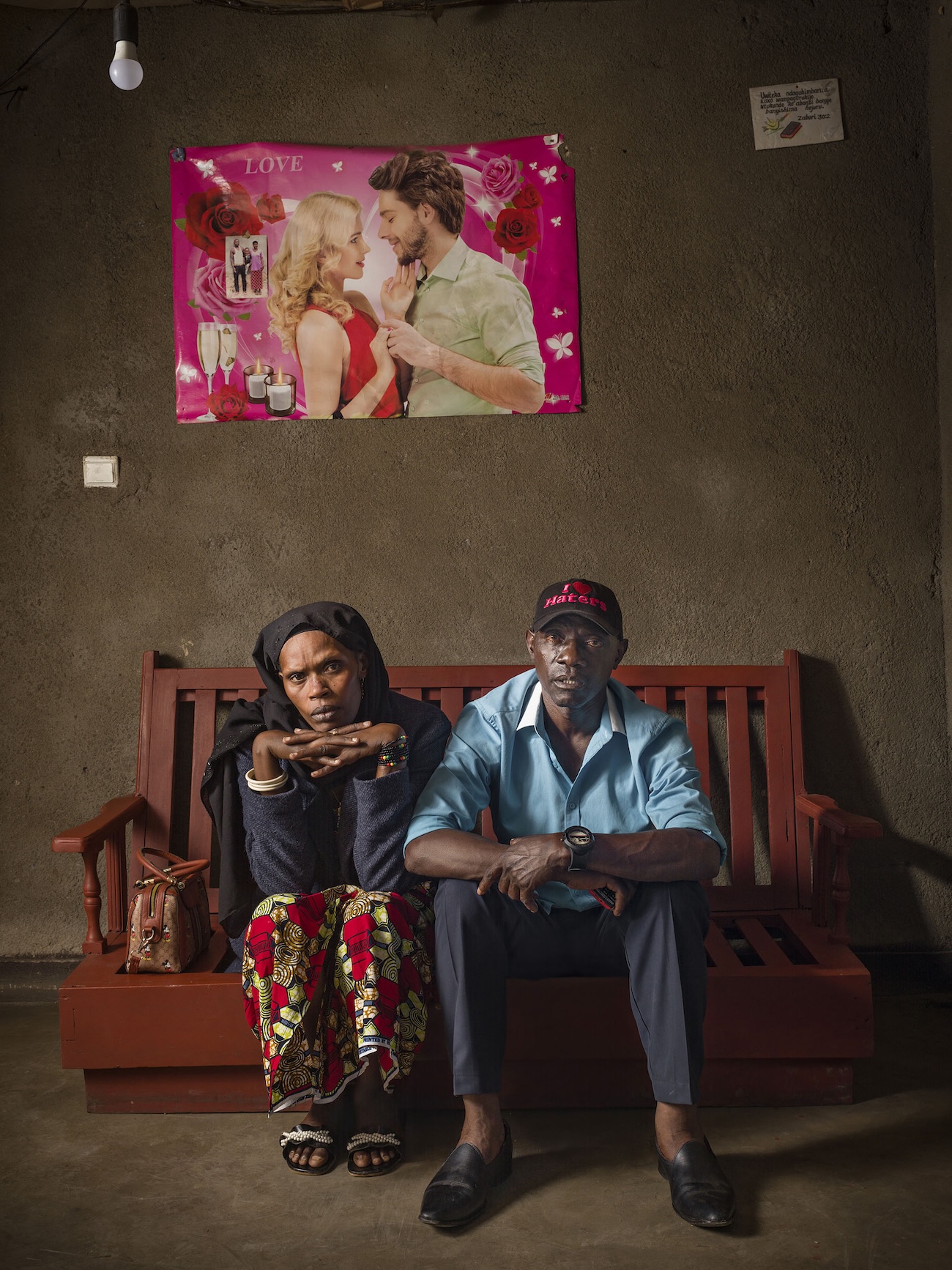 Two People in Rwanda Posing Together in House