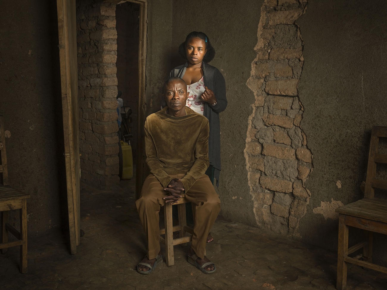 Two People in Rwanda Posing Together in House