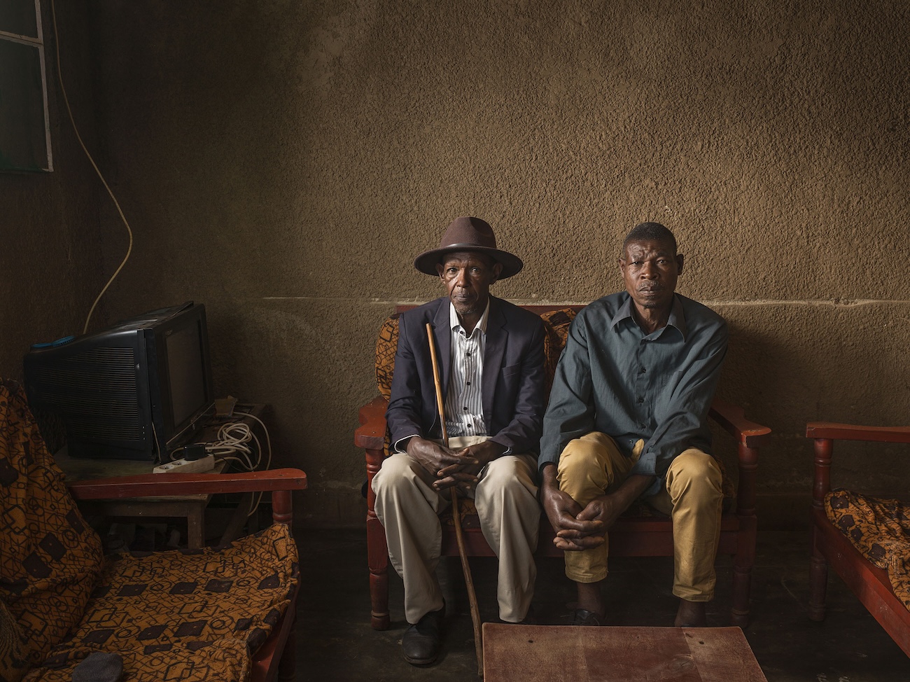 Two People in Rwanda Posing Together in House