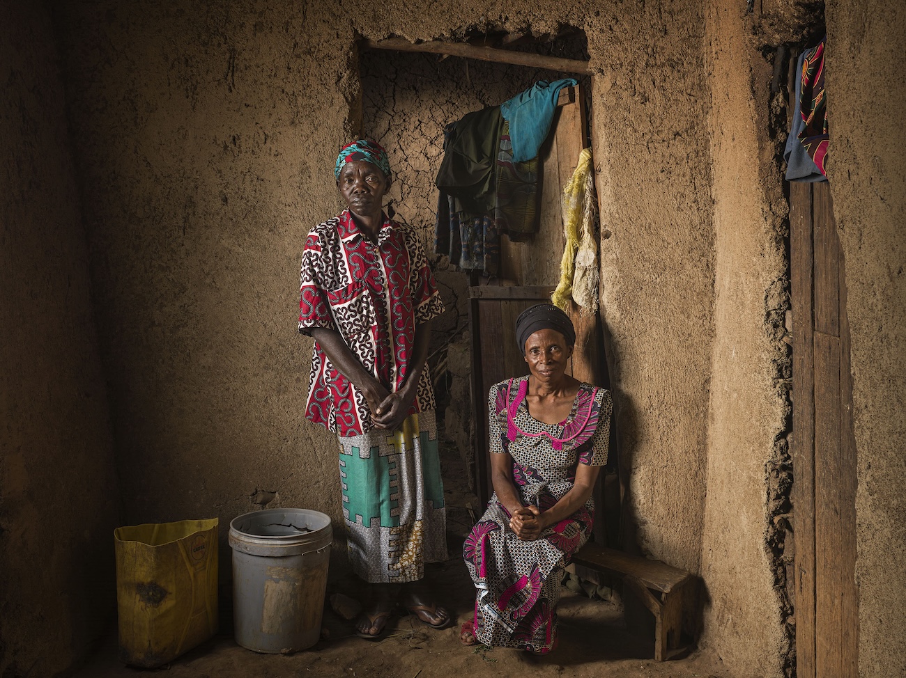 Two People in Rwanda Posing Together in House