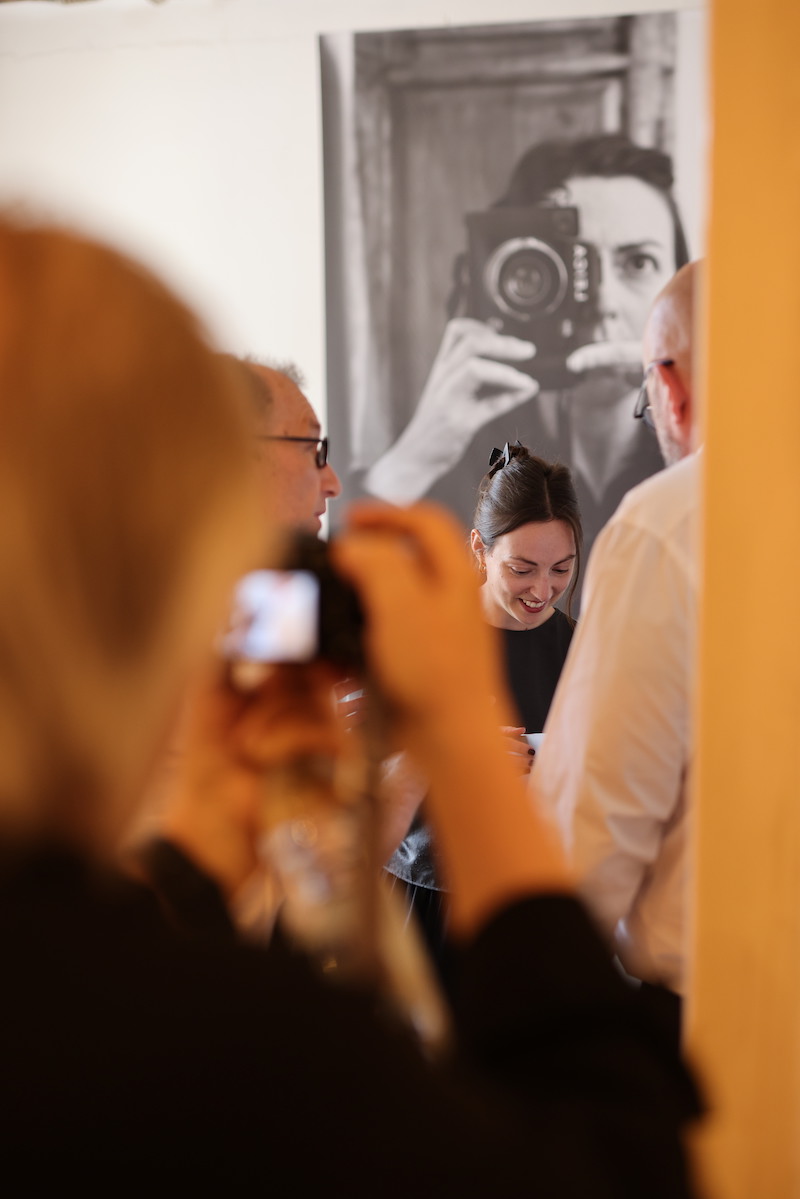 Photographer Hannah Altman at the exhibition's opening.