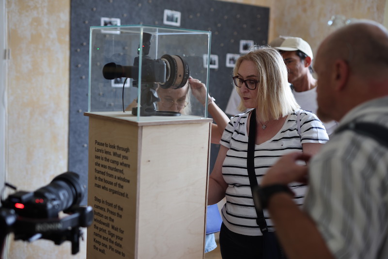 Guests were invited to take and print their own photos with the camp behind them, through Lore's lenses. 