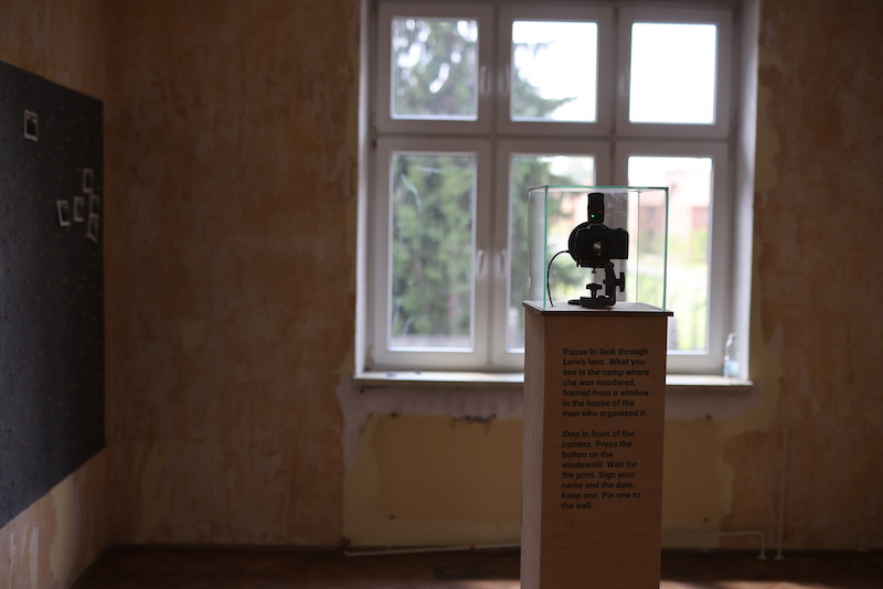 Lore's lenses retrofitted to a modern camera and directed toward the camp through former commandant Rudolf H&ouml;ss's window.