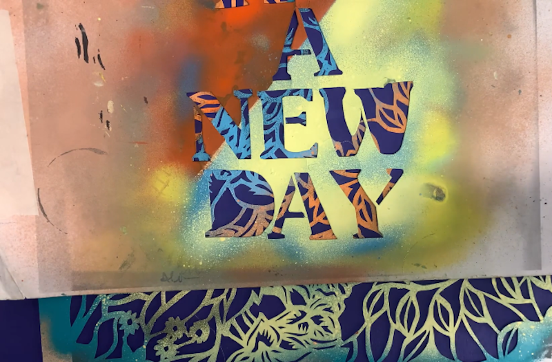 Stencil of "a new day"