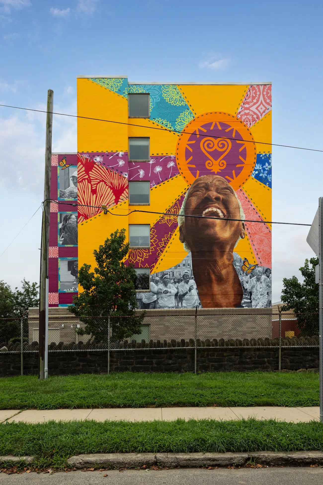 Threads of Joy: Celebrating the Golden Years © 2025 City of Philadelphia Mural Arts Program / Kelley Prevard, 5800 Kingsessing Avenue. Photo by Steve Weinik.