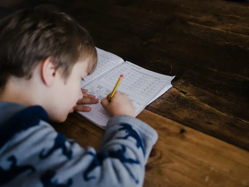 Photo of child taking test. 