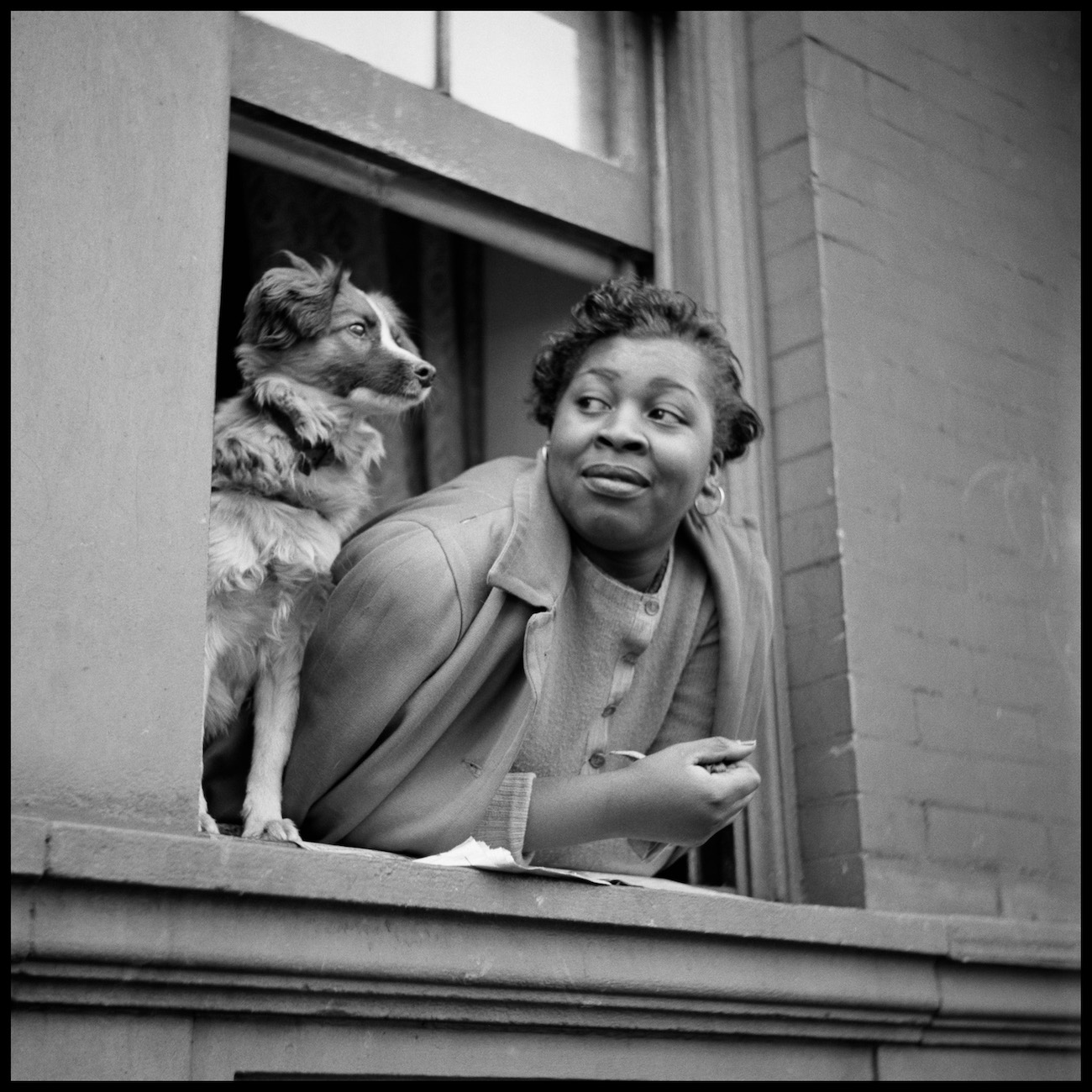 Gordon Parks. Woman and Dog in Window, Harlem, New York, 1943, gelatin silver print, 34 x 34 inches 
