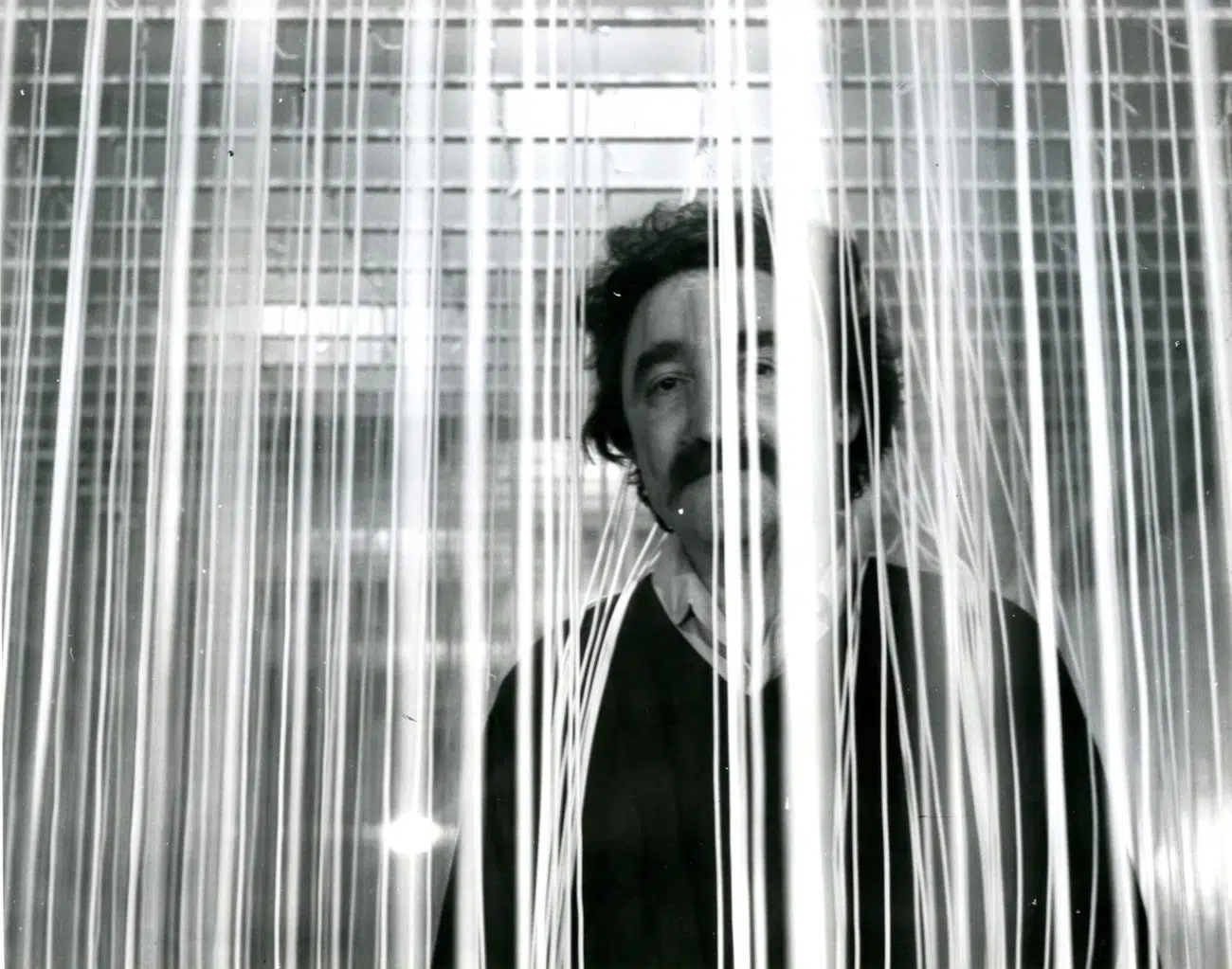 SOTO in the "Petit pénétrable (Small penetrable)" Solo exhibition "Soto", Galerija Suvremene Umjetnosti, Zagreb, Croatia, 1970. &copy; MSU, Zagreb.