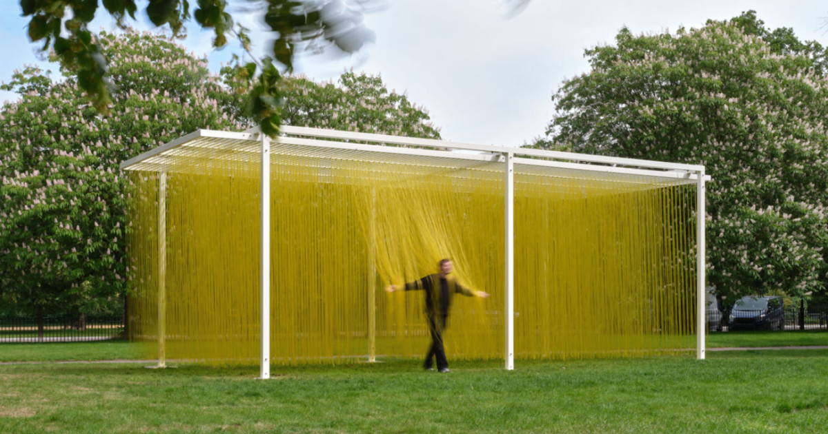 4,000 Bright Yellow Strands Hang in Immersive Installation Inviting Passersby To Walk Through It