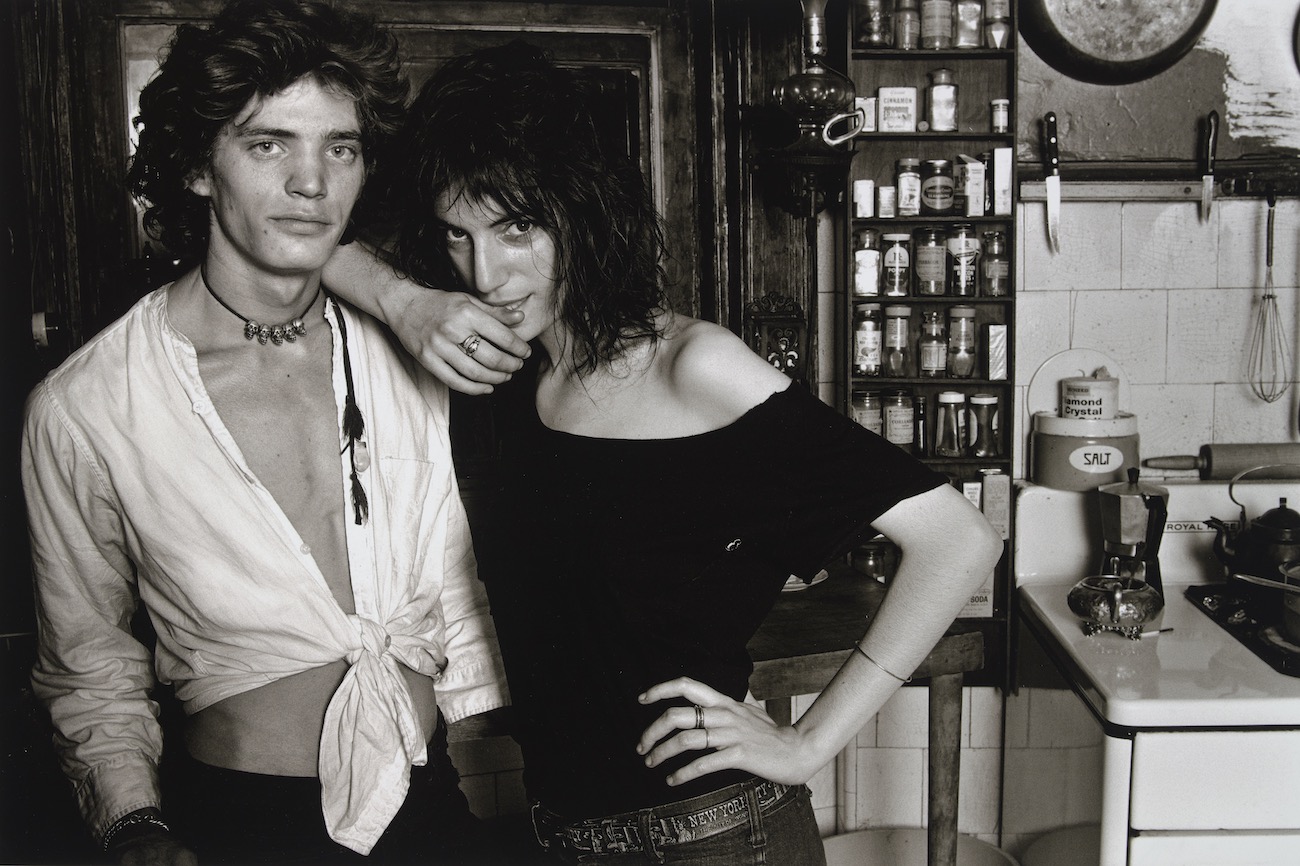 Norman Seeff (American, born South Africa, b. 1939). Robert Mapplethorpe and Patti Smith, New York, 1969. Archival pigment print, 15 x 22 in.