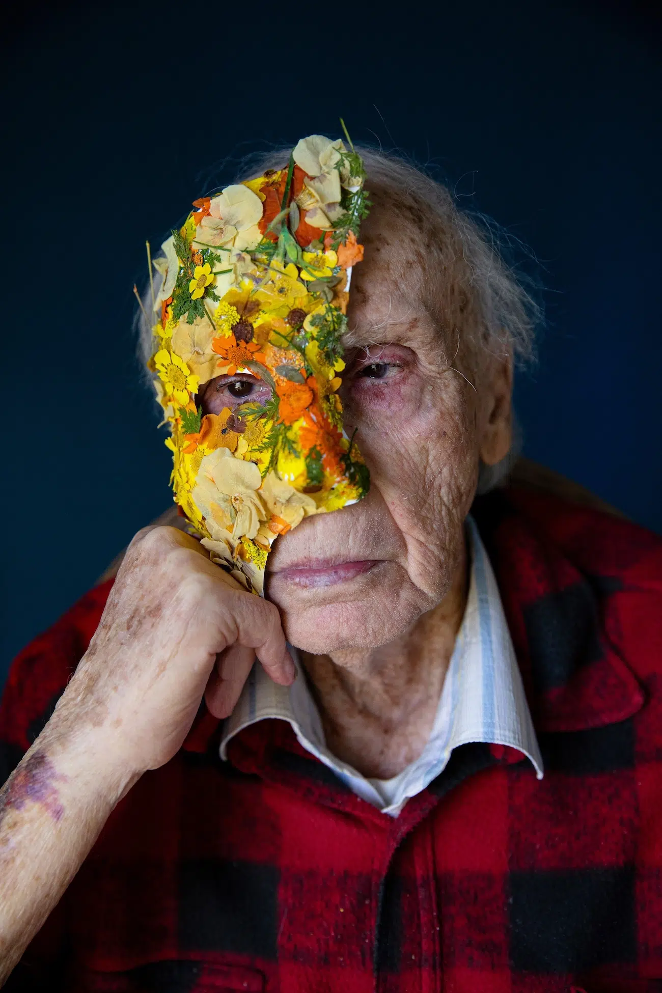 Photo of person in a mask. 