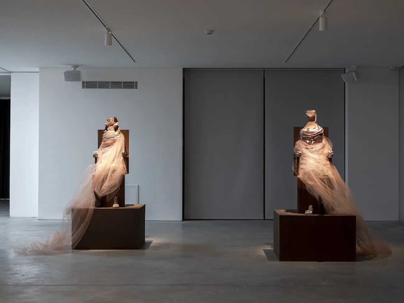 Untitled, 2026, glazed stoneware, iron, rust, tulle, ox horn, diptych, 165 &times; 83.5 &times; 75.5 cm each. 