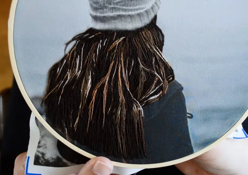 Embroidery on a Photograph Printed on Fabric