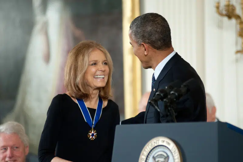 Gloria Steinem receiving Presidential Medal of Freedom from Barack Obama