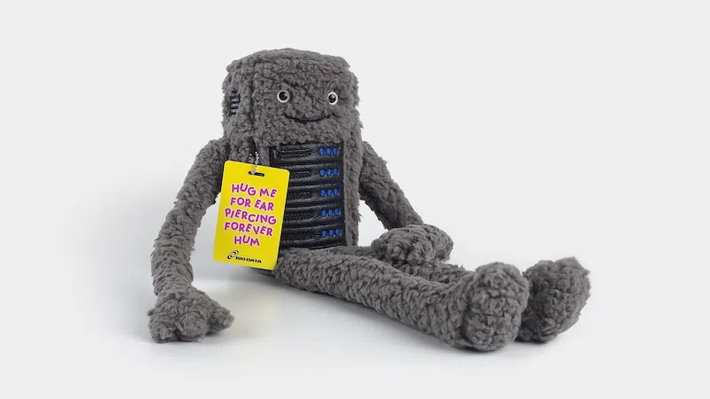 Bezzy the AI Data Center Plushie sitting