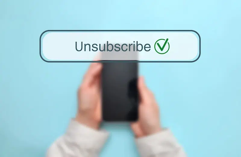 Picture of phone with Unsubscribe over it. 