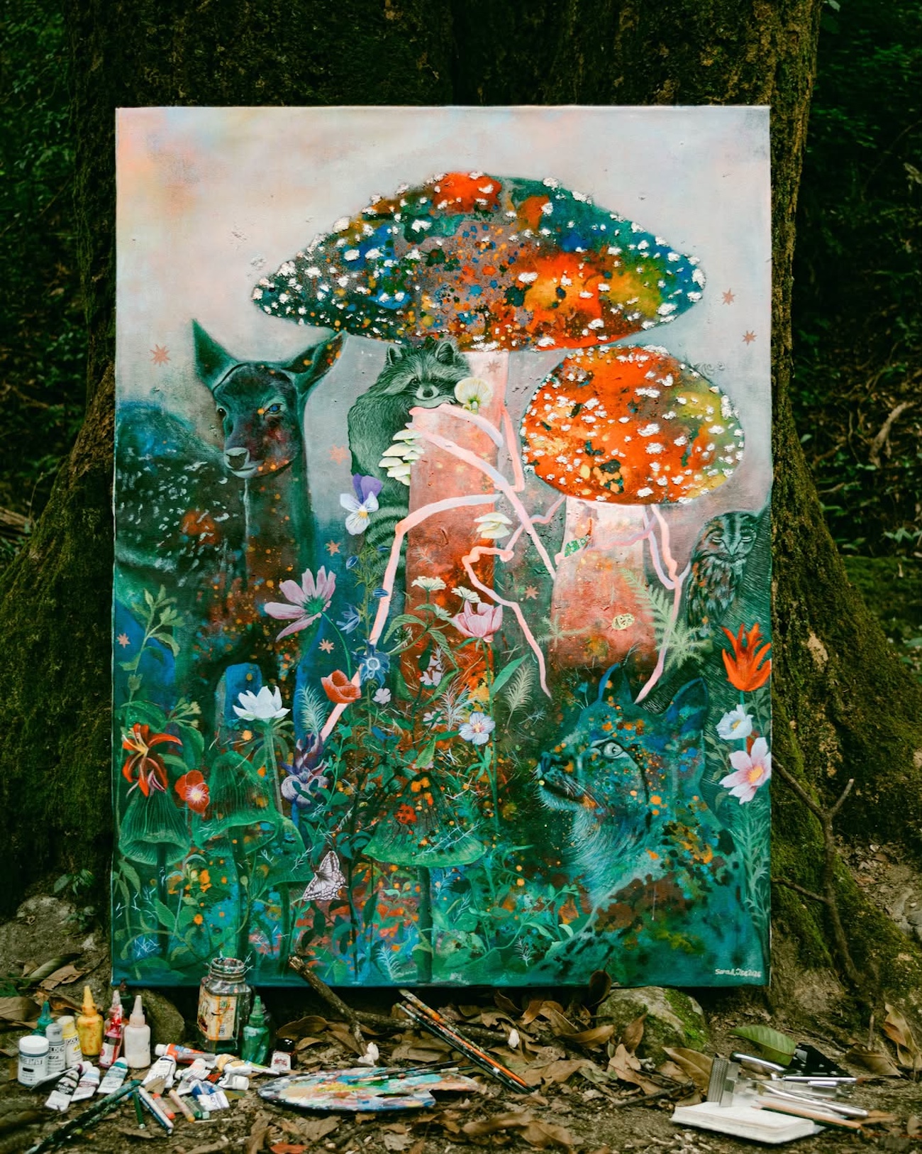 Photo of a painting of mushrooms and animals. 