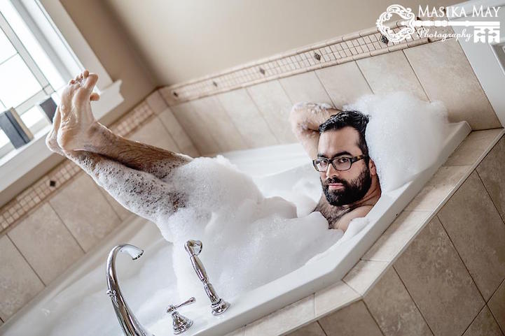 Husband Playfully Poses For The Man Version Of A Sexy Boudoir Photo Shoot