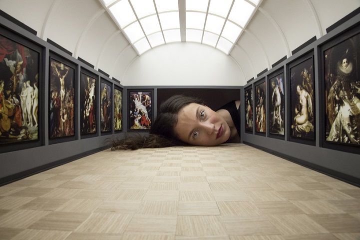 People Stick Their Heads Into Miniature Galleries To Become Part Of