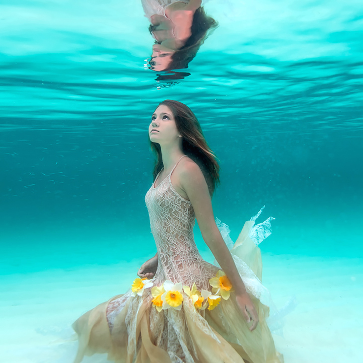 Ethereal Underwater Photos Capture Young Woman's Deep Connection with