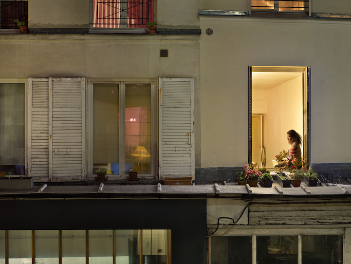 Voyeuristic Photos Capture Intimate Scenes Through Apartment Windows In