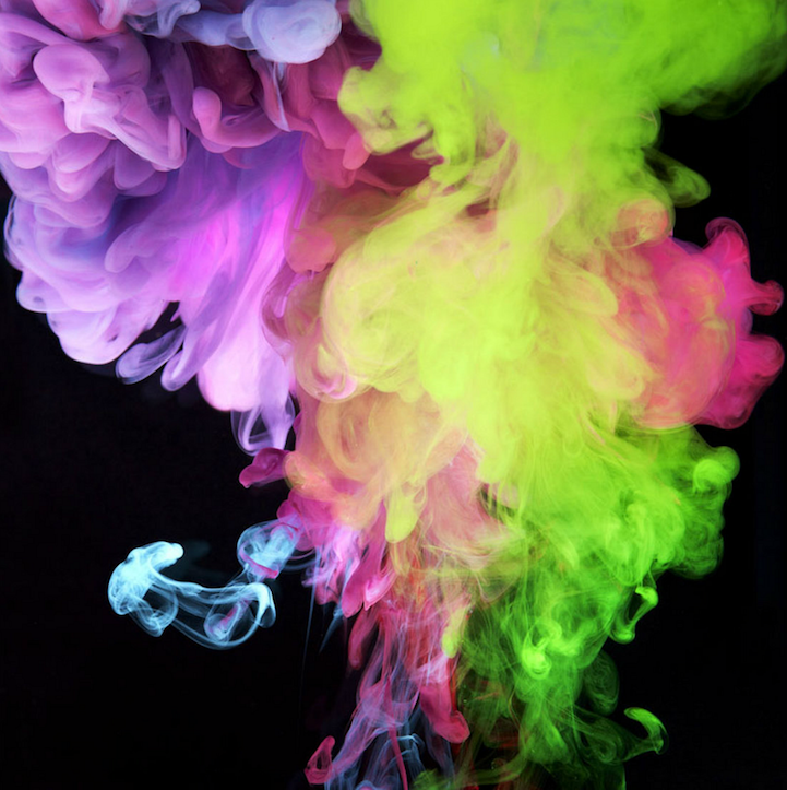 Bright Electric Ink Clouds Burst in Water